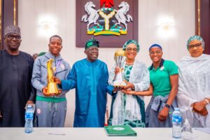 Read more about the article Tinubu Honours WAFCON Champions Super Falcons With National Awards, Cash And Housing